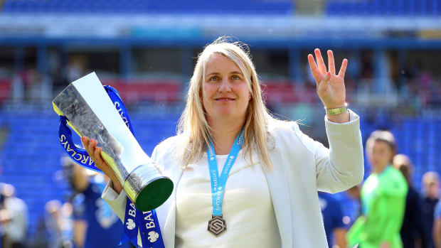 Emma Hayes pictured in May 2023 holding the Women's Super League trophy after leading Chelsea to the title